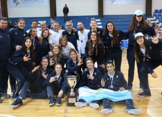 Aplauso, medalla y beso
